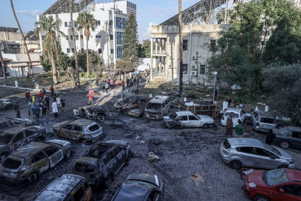 The Al-Ahli Hospital is pictured above a couple hours after it was attacked.